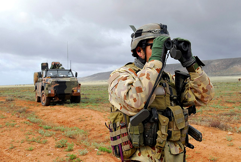 A commando from 2 Company, 1 Commando Regiment, looks out for enemy movement during a mission rehearsal exercise at the Cultana Range in South Australia in preparation for an upcoming deployment.
