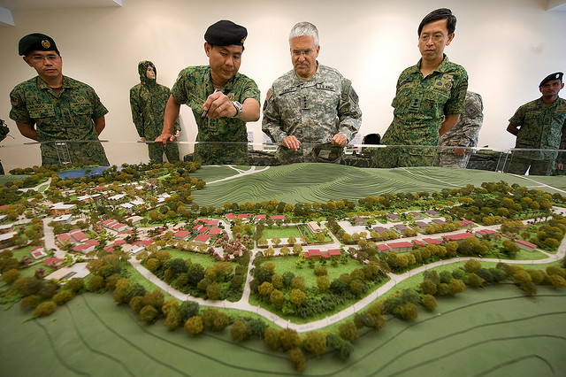 Singaporean army Lt. Col. Jimmy Toh, second from left, briefs Chief of Staff of the U.S. Army Gen. George W. Casey Jr., second from right, about the Murai Urban Warfare Training Facility in Singapore Aug. 26, 2009.