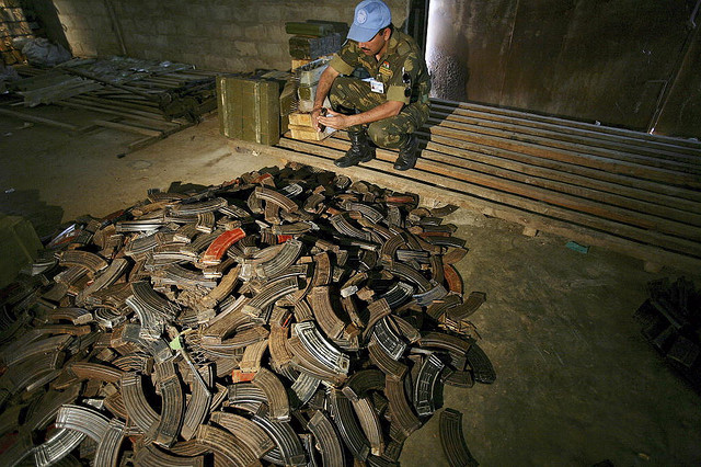 A United Nations peacekeeper from the Indian battalion of the United Nations Organization Mission in the Democratic Republic of the Congo (MONUC) examines AK-47 magazines stored in a warehouse in Beni, where all weapons and ammunition are stored after they have been collected in the demobilization process in Matembo, North Kivu, in the Democratic Republic of the Congo.