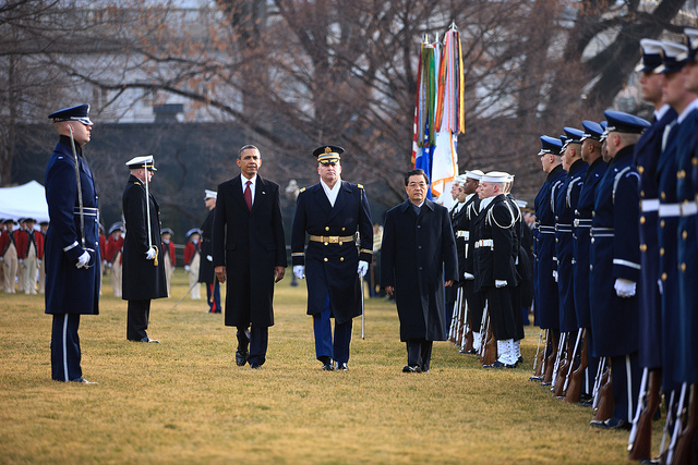 Army Colonel David Anders escorts President Barack Obama and President Hu Jintao of China as they review the troops on the South Lawn of the White House, Jan. 19, 2011. (Official White House Photo by Lawrence Jackson)