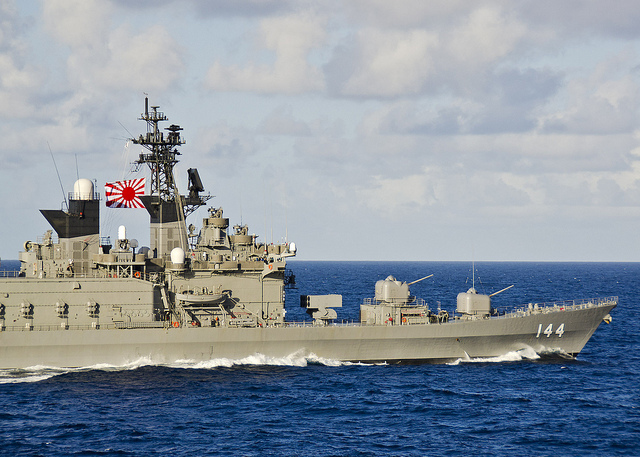 The Japan Maritime Self-Defense Force (JMSDF) helicopter destroyer JS Kurama (DDH 144) performs maneuvers during training as part of the integrated maritime exercise Koa Kai, November 2011.