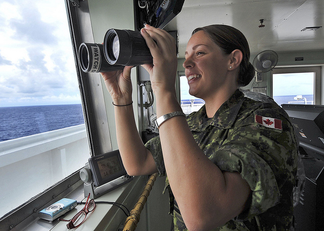 PACIFIC OCEAN (Aug. 27, 2012) - Canadian Navy Lt. Lois Lane assists with lookout duties in the pilothouse of Military Sealift Command hospital ship USNS Mercy (T-AH 19) as Mercy transits back to San Diego after completing a four and a half month mission. Pacific Partnership, an annual U.S. Pacific Fleet humanitarian and civic assistance mission now in its seventh year, brings together U.S. military personnel, host and partner nations, non-government organizations and international agencies to build stronger relationships and develop disaster response capabilities throughout the Asia-Pacific region. (U.S. Navy photo by MC2 Roadell Hickman)