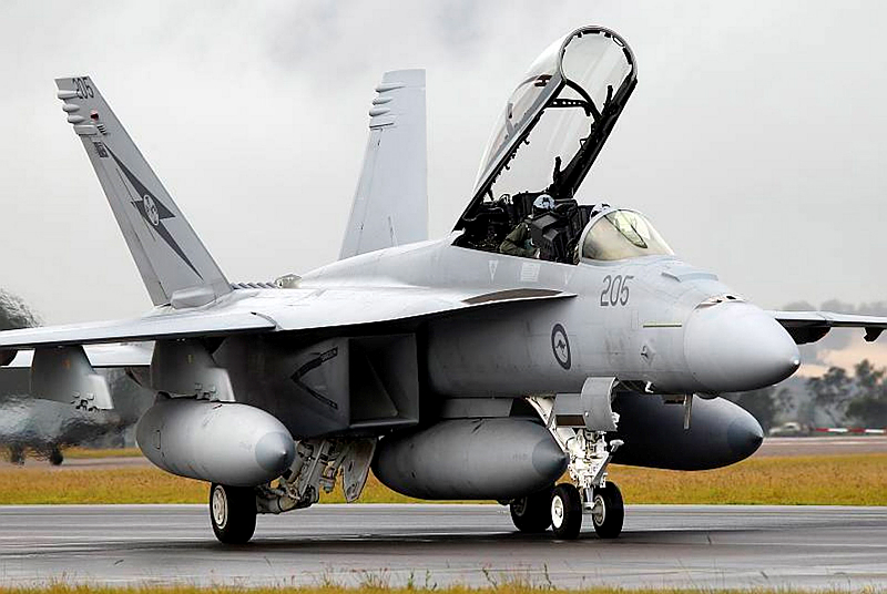 A F/A-18F Superhornet taxis in after the simulated strike on RAAF Base Williamtown.