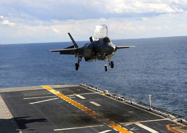 ATLANTIC OCEAN (Oct. 3, 2011) An F-35B Lightning II makes the first vertical landing on a flight deck at sea aboard the amphibious assault ship USS Wasp (LHD 1). The F-35B is the Marine Corps Joint Strike Force variant of the Joint Strike Fighter and is designed for short takeoff and vertical landing on Navy amphibious ships. (U.S. Navy photo by Mass Communication Seaman Natasha R. Chalk/Released) 