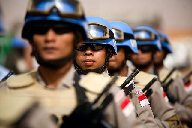 30 May 2010. El Fasher: Members of the Indonesia's Formed Police Unit (FPU) during the celebrations for the International Day of UN Peacekeepers in El Fasher UNAMID Arc Compound. Photo by Albert Gonzalez Farran / Unam
