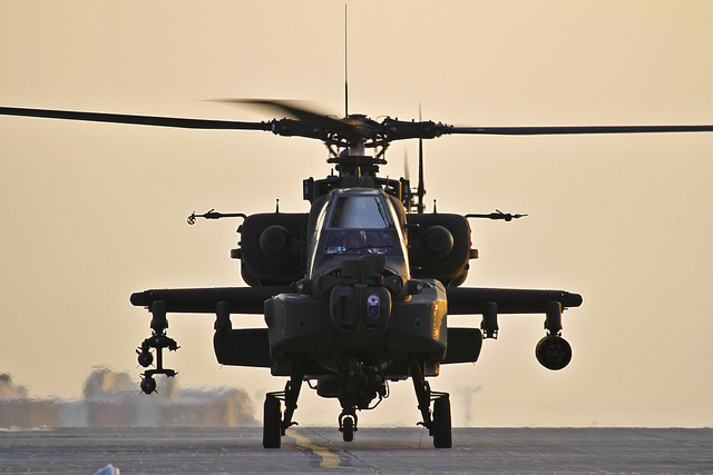 A U.S. Army AH-64 Apache attack helicopter prepares to depart Bagram Air Field, Afghanistan, on Jan 7, 2012. The Apache conducts distributed operations, precision strikes against relocatable targets, and provides armed reconnaissance when required in day, night, obscured battlefield and adverse weather conditions U.S. Air Force photo/Tech. Sgt. Matt Hecht