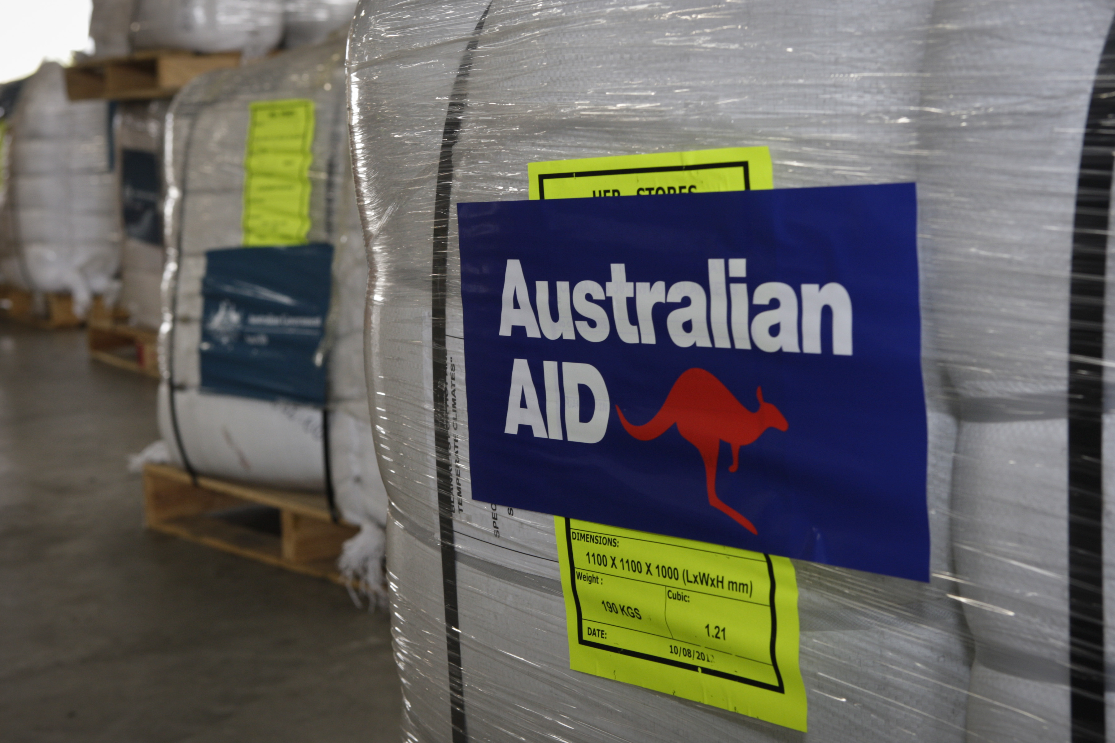 Pallets of emergency aid supplies lined up and ready to be dispatched to a No. 36 Squadron C-17A Globemaster for delivery to cyclone ravaged Fiji in 2012.  