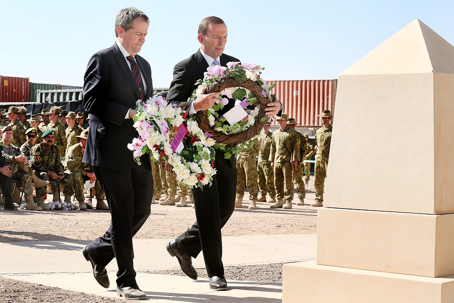 Leader of the Opposition Bill Shorten and Prime Minister Tony Abbott lay wreaths as a mark of respect to the fallen during the Recognition Ceremony at Multi-National Base - Tarin Kot. 