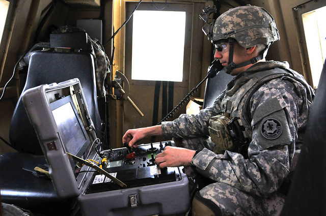 U.S. Army Sgt. Robert Solberg with Engineer Troop, 4th Squadron, 2nd Cavalry Regiment, controls a Talon explosive ordinance disposal robot from inside an armored vehicle to destroy an improvised explosive device during pre-deployment training Feb. 20, 2013 at Grafenwoehr Training Area, Germany. The Troop used Husky Metal Detecting and Marking Vehicles, RG-31 Mk3a armored fighting vehicles and Buffalo Mine Protected Clearance Vehicles to conduct counter-IED training. U.S. Army Photo by Spc. Joshua Edwards