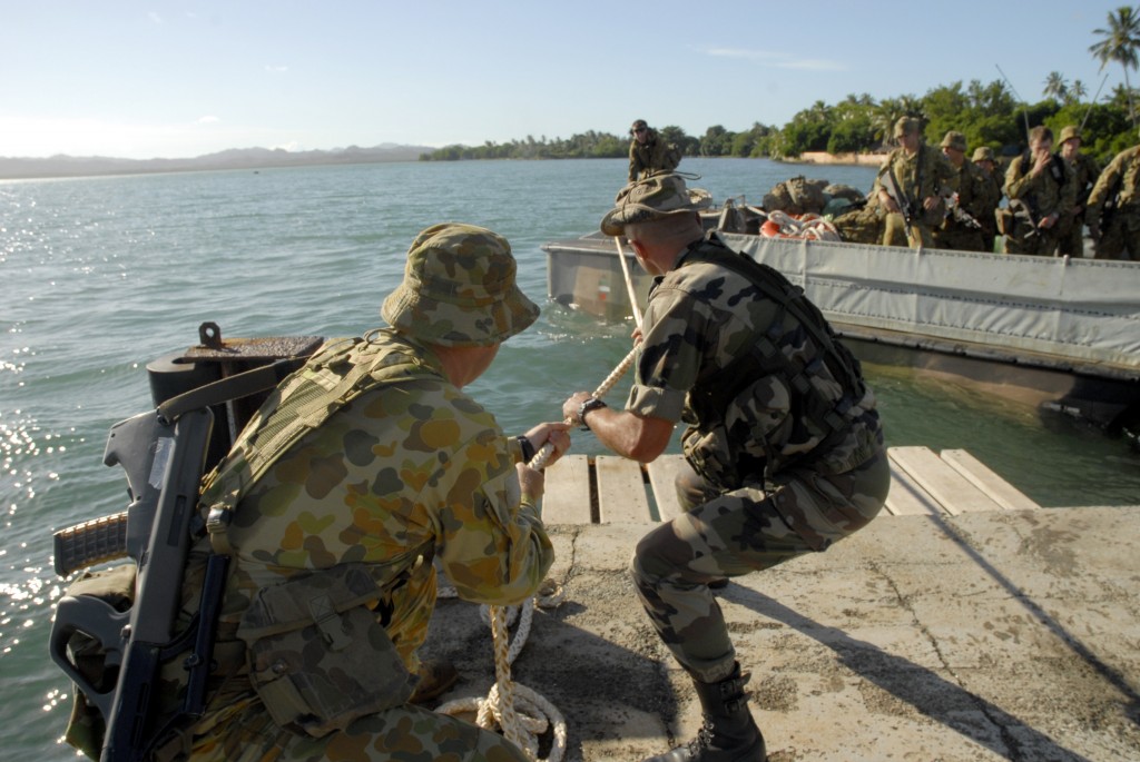 A French soldier and Australian officer help land a LARC at Poum, New Caledonia during Exercise Croix du Sud 2008. Independence movements in French territories in the Pacific have the potential to affect closer Australia-France defence cooperation in the region.