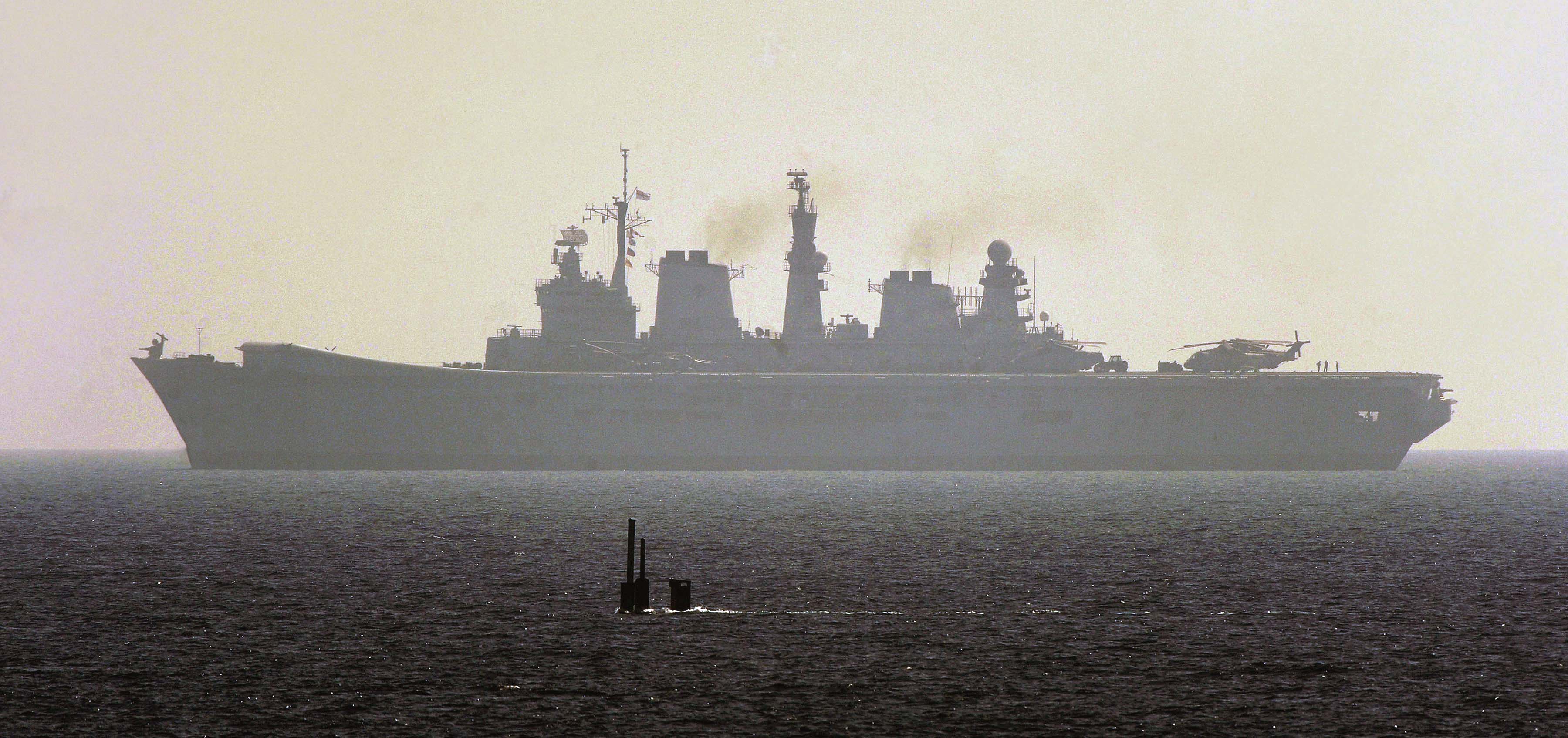 Periscope of USS Dallas and HMS Illustrious (C) Crown copyright 2013
