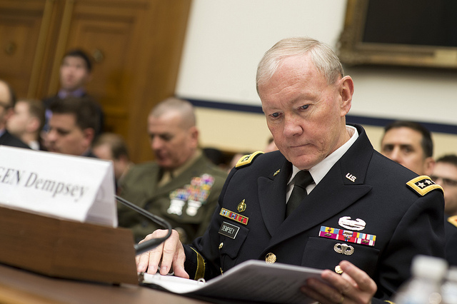 Chairman of the Joint Chiefs of Staff General Martin Dempsey prepares to testify before the House Armed Service Committee at the Rayburn House Office Building in Washington D.C. on March 6, 2014. Dempsey and Secretary of Defense Chuck Hagel addressed the 2015 Department of Defense Budget Proposal as remarked on the steps the Department has taken to separate itself from military cooperations with Russia in response to the situation in Ukraine. DoD Photo by Erin A. Kirk-Cuomo (Released)