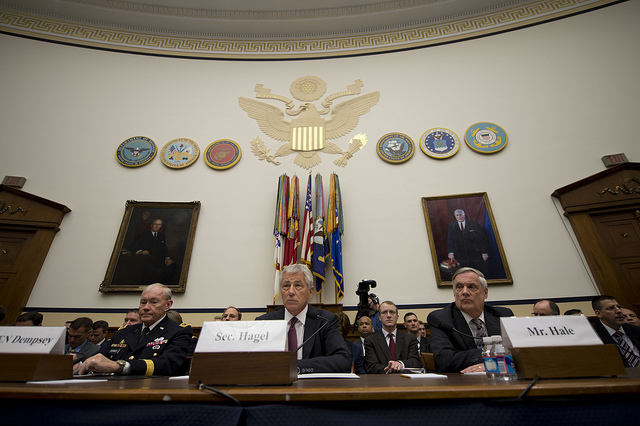 Secretary of Defense Chuck Hagel, center, testifies before the House Armed Services Committee on the Department of Defense budget request for fiscal year 2014 at the Rayburn House Office Building in Washington, D.C., April 11, 2013. U.S. Army Gen. Martin E. Dempsey, left, the chairman of the Joint Chiefs of Staff, and Under Secretary of Defense Robert Hale, the department comptroller, joined Hagel for the testimony. (DoD photo by Erin A. Kirk-Cuomo/Released)