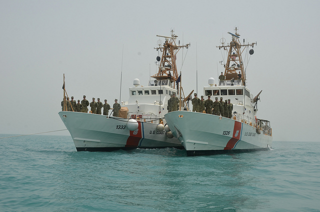US Coast Guard vessels Cutters Adak and Monomoy.