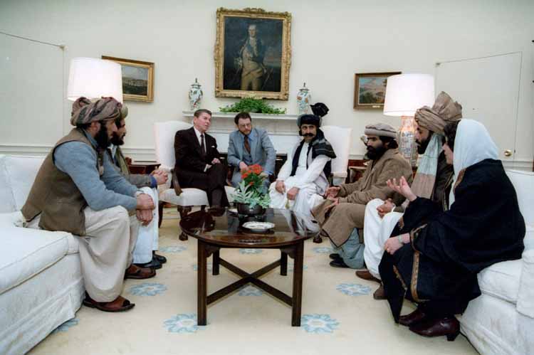 President Reagan meeting with Afghan Freedom Fighters to discuss Soviet atrocities in Afghanistan. 2/2/83