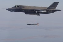 An F-35B completes a test aerial weapons release of an inert 500-pound GBU-12 Paveway II laser-guided bomb.