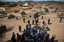 Head of UN Peacekeeping Herve Ladsous is visting Mali. He is seen here speaking to UN Peacekeepers from Chad at the site of the suicide attack that killed two peacekeepers in Tessalit on 23 October.