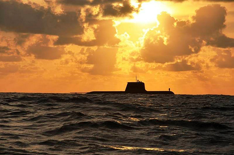 The Royal Australian Navy Collins Class Submarine HMAS Sheean at sunset during a routine transit and training exercise off Christmas Island.