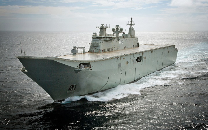 The largest ship ever built for the Royal Australian Navy, Landing Helicopter Dock NUSHIP Canberra, passes through Sydney Heads for the first time. She will be commissioned into the RAN as HMAS Canberra. 