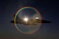 A Royal Australian Air Force F/A-18F Super Hornet, with the sun directly behind it, provides an unusual but spectacular sight during a mission in the skies over Iraq.