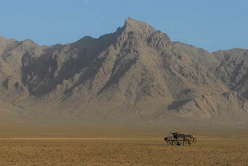 An ASLAV from the 3rd Reconstruction Task Force is pictured against the backdrop of Afghanistan's searing and rugged mountains during a patrol.