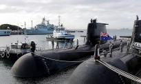 HMAS Sheean departs Fleet Base West: in the foreground is HMAS Dechaineux and in the background are HMAS Stuart and astern HMAS Toowoomba.