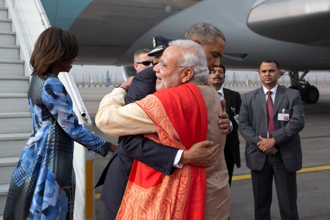 President Obama greets Prime Minister Narendra Modi of India as he and First Lady Michelle Obama arrive at Air Force Station Palam in New Delhi, India, Jan. 25, 2015. (Official White House Photo by Pete Souza)