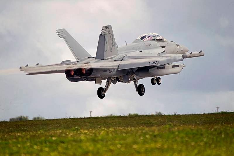 A United States Navy EA-18G Growler takes off from Andersen Air Force Base, Guam during Exercise Cope North 14.