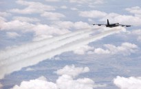 A U.S. Air Force aircrew assigned to the 23rd Bomb Squadron from Minot Air Force Base N.D., flies an Air Force B-52 Stratofortress bomber aircraft on an eight-hour sortie going over bomb dropping sequences and air refueling, April 20, 2011.