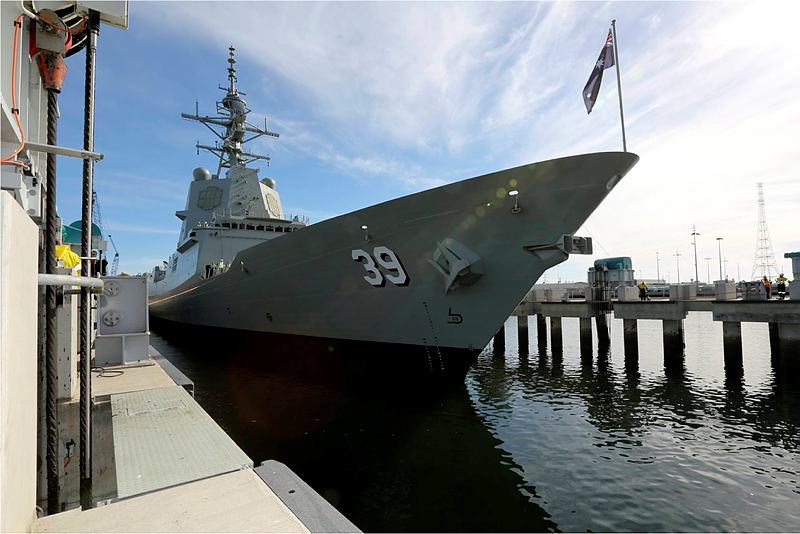 The Guided Missile Destroyer - Hobart sits in the shiplift moments before the announcement of her floating for the first time.