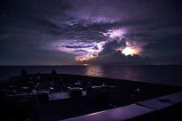 SOUTH CHINA SEA (June 13, 2015) Lightning strikes the water as San Antonio-class amphibious transport dock ship USS Anchorage (LPD 23) navigates between storms.