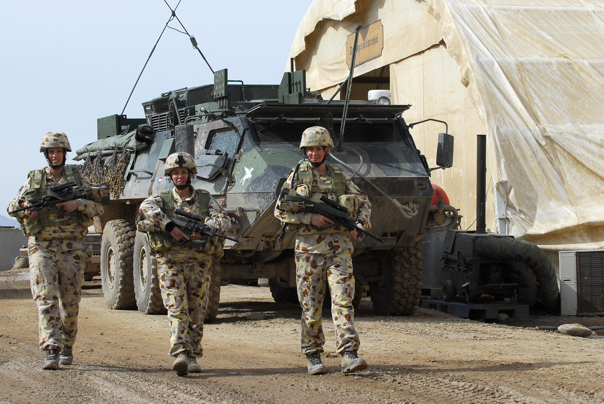 Caption: Women in Army, (L-R) Corporal Amanda Wright, Corporal Cindy Veenman and Captain Karin Cann are regulars outside the wire of Multinational Base Tarin Kowt. Mid Caption: Women of the Australian military, police and civilian agencies deployed at the Multinational Base Tarin Kowt undertake a range of critical roles in support of Australia's joint agency approach in Oruzgan Province. Some of these roles include Afghan National Police development, health services, administrative support, community and political liaison, combat service and support, military transport driving, and security support. Deep Caption: Operation SLIPPER is Australia's military contribution to the international campaign against terrorism, piracy and improving maritime security. Under this operation our forces contribute to the efforts of the North Atlantic Treaty Organisation (NATO) - led International Security Assistance Force (ISAF) in Afghanistan. ISAF seeks to bring security, stability and prosperity to Afghanistan and aims to prevent Afghanistan again becoming a safe haven for international terrorists. Operation SLIPPER also supports the United States led International Coalition Against Terrorism (ICAT) in the broader Middle East.